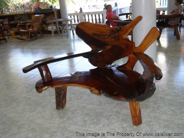 old chair made from tree bark